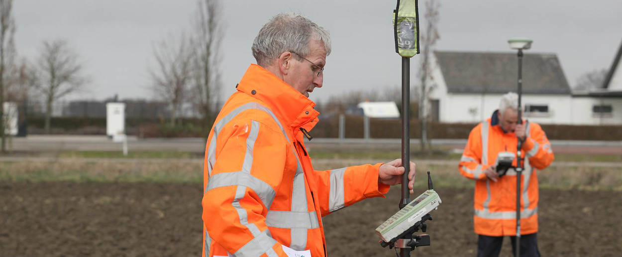 landmeters aan het werk